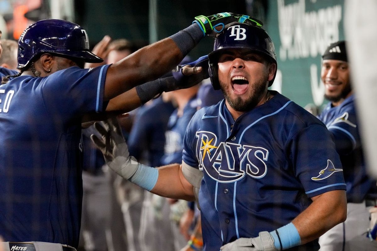 Sep 5, 2026; Arlington, Texas, USA;  Tampa Bay Rays first baseman Jonathan Aranda (8) reacts in the dugout after hitting a three-run home run against the Texas Rangers during the tenth inning at Globe Life Field. Mandatory Credit: Raymond Carlin III-Imagn Images