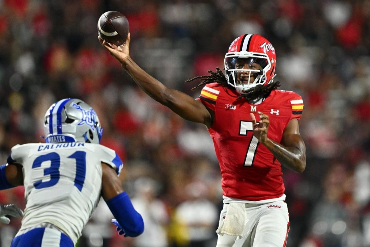 Sep 5, 2026; College Park, Maryland, USA;  Maryland Terrapins quarterback Malik Washington (7) passes in the first half against the Hampton Pirates at SECU Stadium. Mandatory Credit: Jamie Sabau-Imagn Images