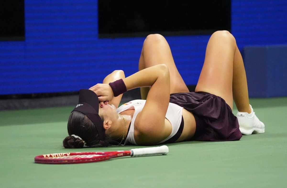 Iva Jovic fell to the court after defeating Alex Eala in a third-round match at the U.S. Open that lasted more than three hours.