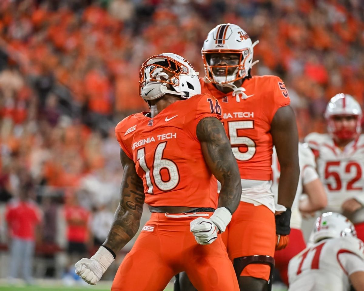 Sep 5, 2026; Blacksburg, Virginia, USA;  Virginia Tech Hokies linebacker Noah Chambers (16) celebrates after a tackle for a loss against the VMI Keydets during the first quarter at Lane Stadium.  Mandatory Credit: Brian Bishop-Imagn Images