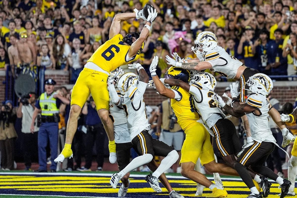 Michigan wide receiver JJ Buchanan (6) catches for a touchdown against Western Michigan to win the game 13-12 as time expires during the second half at Michigan Stadium in Ann Arbor on Saturday, Sept. 5, 2026.