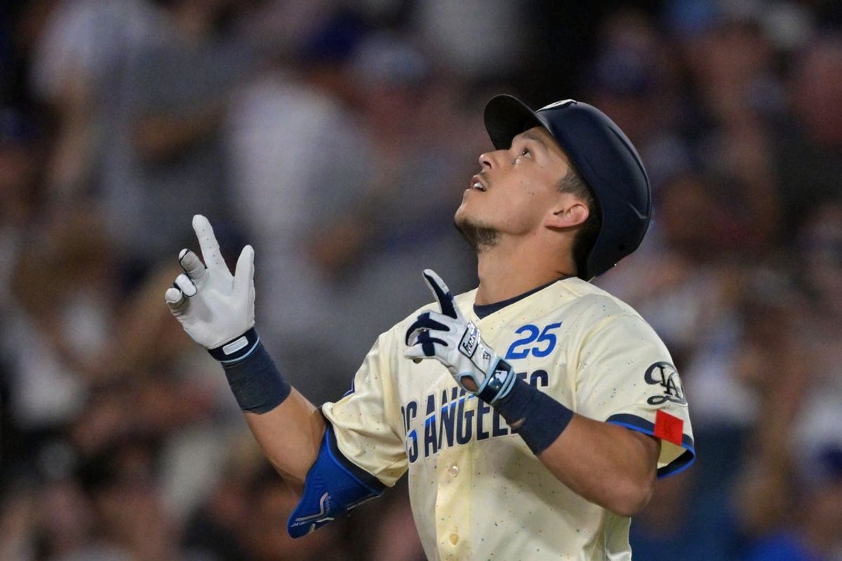 Sep 5, 2026; Los Angeles, California, USA;  Los Angeles Dodgers second base Tommy Edman (25) reacts after hitting a home run during the seventh inning against the Washington Nationals at UNIQLO Field at Dodger Stadium.  Mandatory Credit: Jayne Kamin-Oncea-Imagn Images