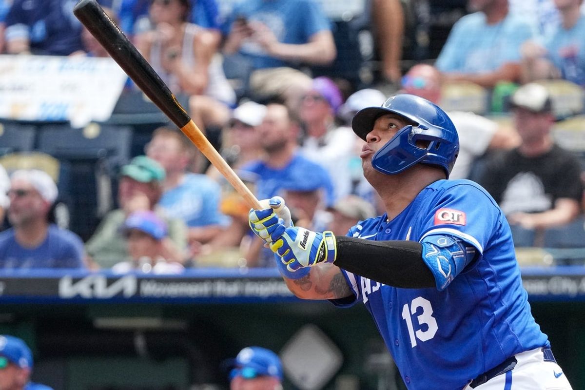 Sep 6, 2026; Kansas City, Missouri, USA; Kansas City Royals designated hitter Salvador Perez (13) hits a two run home run against the Toronto Blue Jays during the third inning at Kauffman Stadium. Mandatory Credit: Denny Medley-Imagn Images