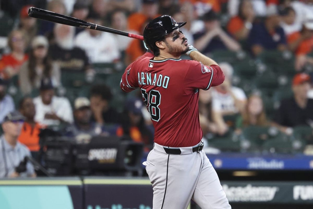 Sep 6, 2026; Houston, Texas, USA; Arizona Diamondbacks third baseman Nolan Arenado (28) bats during the eighth inning against the Houston Astros at Daikin Park. Mandatory Credit: Troy Taormina-Imagn Images