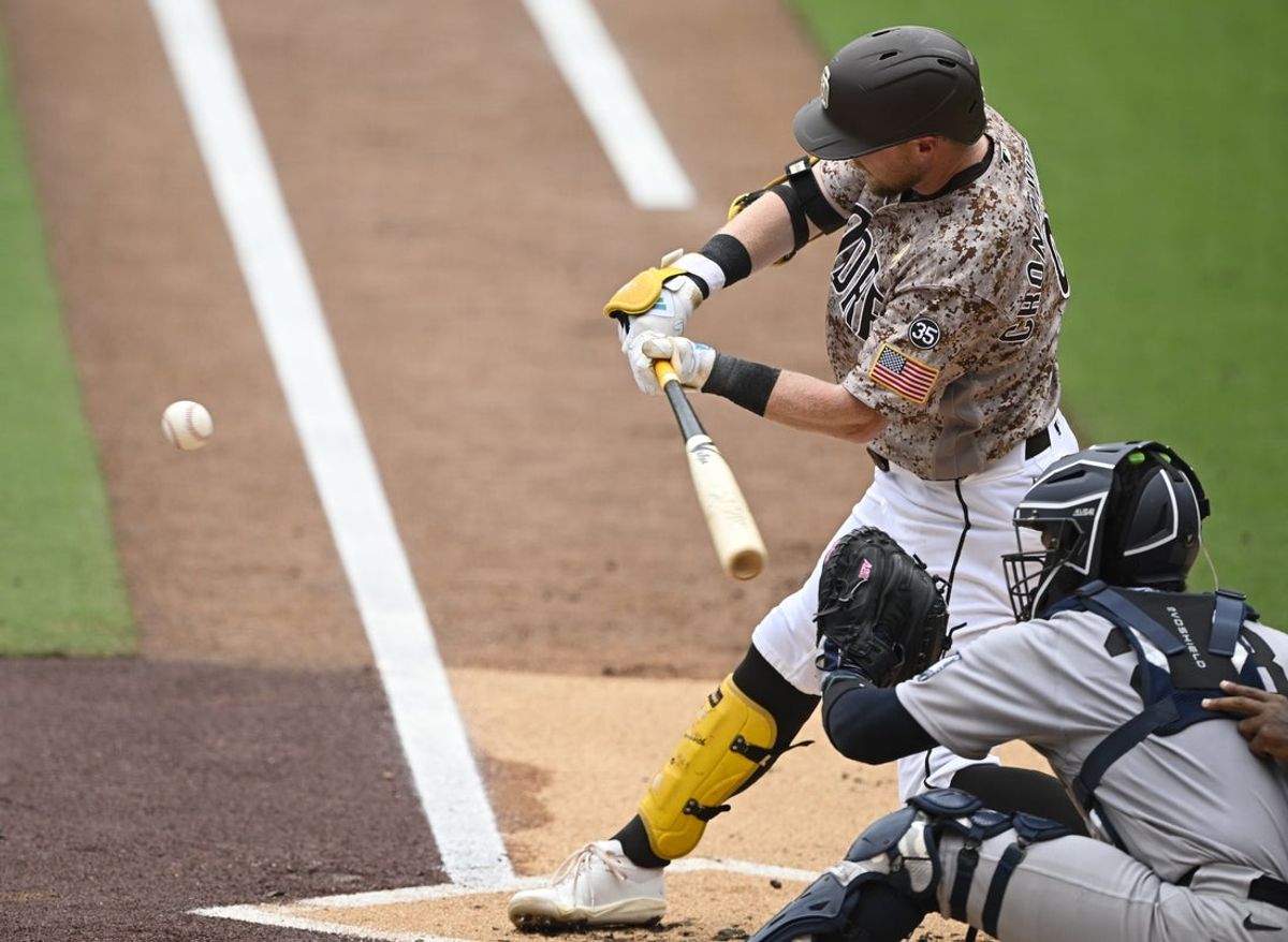 Sep 6, 2026; San Diego, California, USA;  San Diego Padres second baseman Jake Cronenworth (9) hits a solo home run during the first inning against New York Yankees the at Petco Park.  Mandatory Credit: Denis Poroy-Imagn Images