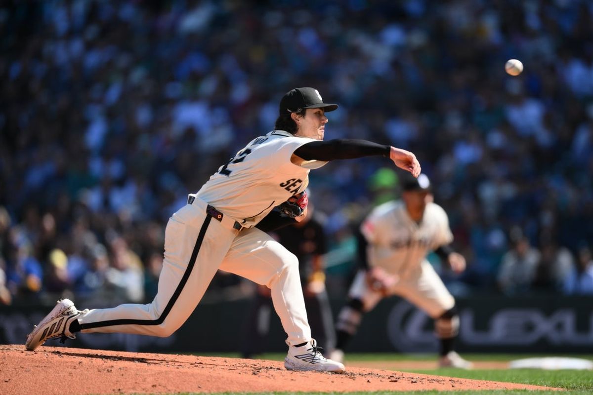 Sep 6, 2026; Seattle, Washington, USA; Seattle Mariners starting pitcher Bryan Woo (22) pitches to the against the Athletics during the fourth inning at T-Mobile Park. Mandatory Credit: Steven Bisig-Imagn Images