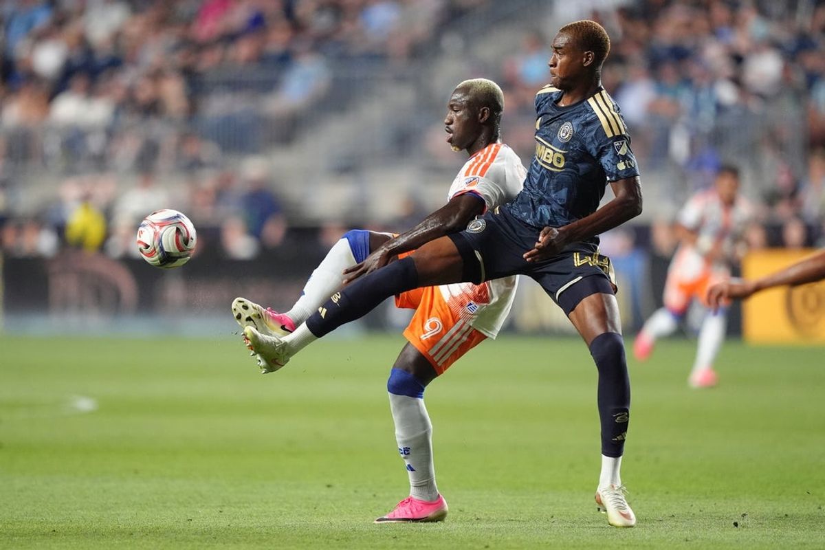 Sep 9, 2026; Chester, Pennsylvania, USA; FC Cincinnati forward Kevin Denkey (9) and Philadelphia Union defender Neil Pierre (44) battle for the ball in the first half at Subaru Park. Mandatory Credit: Kyle Ross-Imagn Images