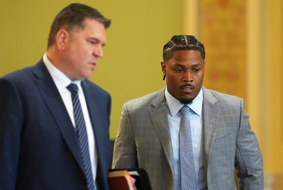 Green Bay Packers running back Josh Jacobs, right, appears in a Brown County courtroom on Sept. 10, 2026 in Green Bay, Wis., with his attorney Clarence Duchac III for a hearing. He pleaded no contest to misdemeanor battery and criminal damage to property charges after an incident in May.