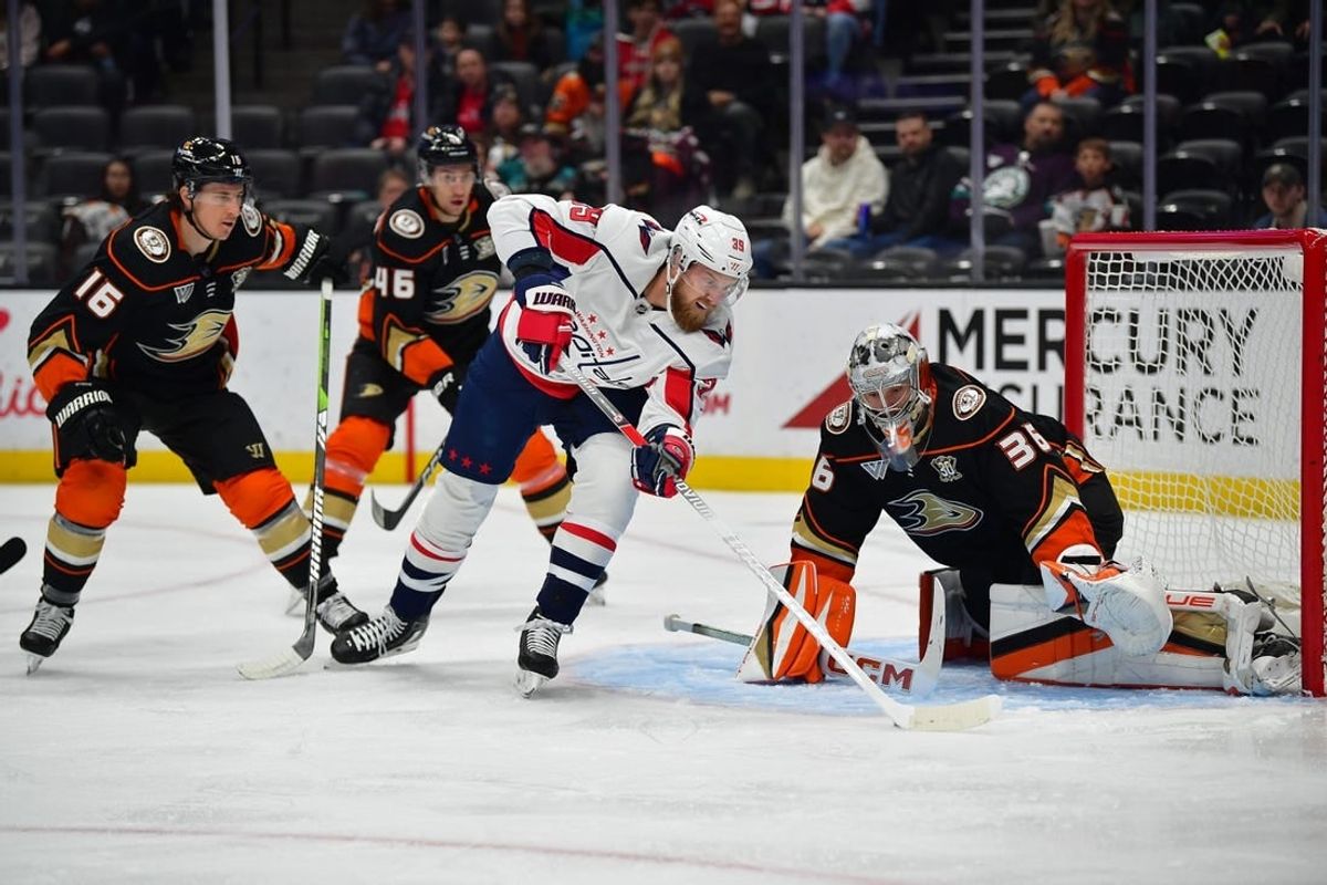 Nov 30, 2023; Anaheim, California, USA; Washington Capitals right wing Anthony Mantha (39) moves in to score a goal against Anaheim Ducks goaltender John Gibson (36) during the first period at Honda Center.