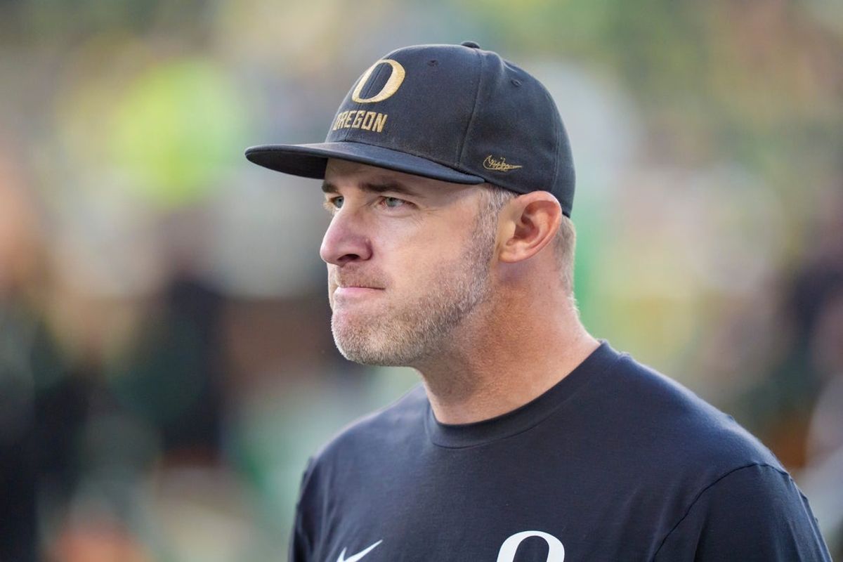 Oregon offensive coordinator Drew Mehringer walks the field before the game as the Oregon Ducks host the Portland State Vikings on Sept. 18, 2026, at Autzen Stadium in Eugene, Oregon.