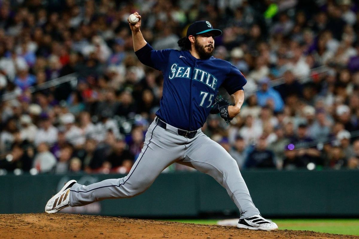 Sep 18, 2026; Denver, Colorado, USA; Seattle Mariners relief pitcher Andres Munoz (75) pitches in the ninth inning against the Colorado Rockies at Coors Field. Mandatory Credit: Isaiah J. Downing-Imagn Images