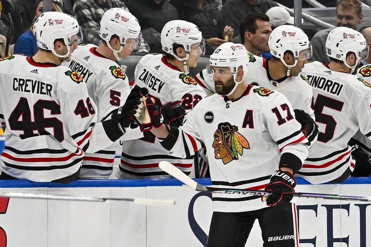Dec 23, 2023; St. Louis, Missouri, USA;  Chicago Blackhawks left wing Nick Foligno (17) is  congratulated by teammates after scoring against the St. Louis Blues during the second period at Enterprise Center.