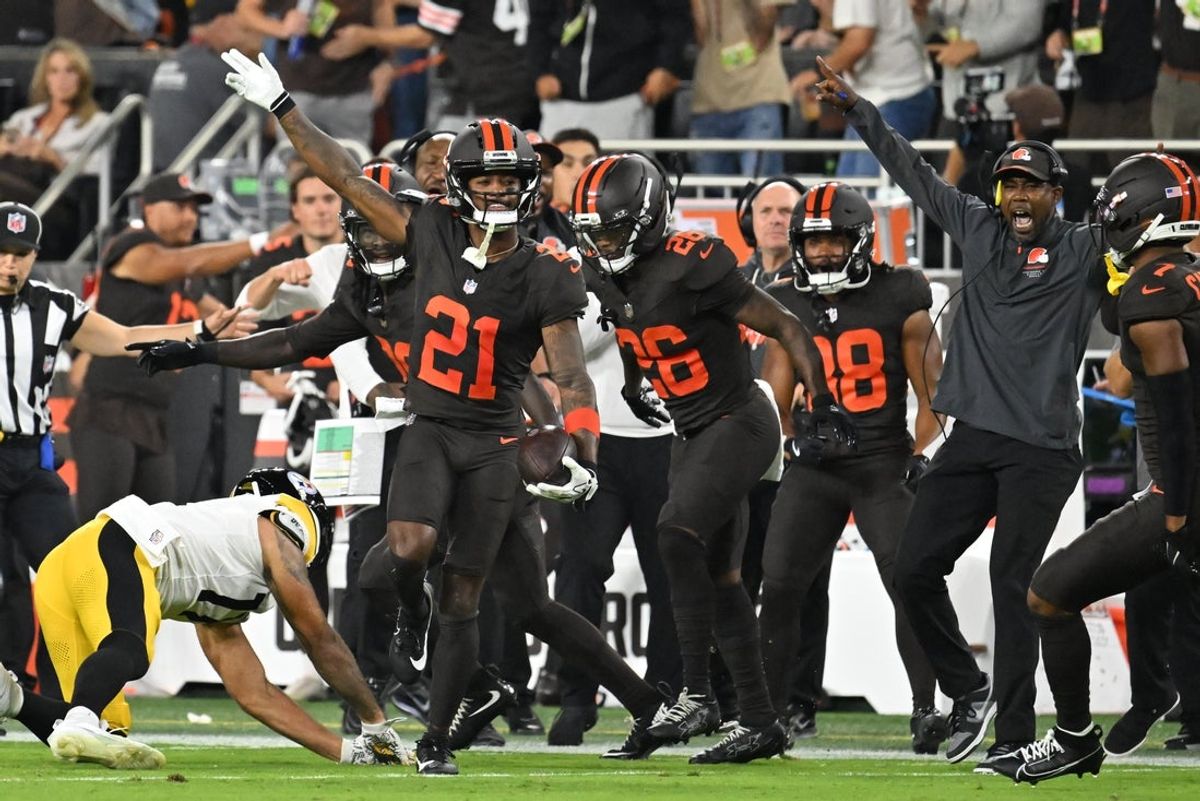 Oct 1, 2026; Cleveland, Ohio, USA;  Cleveland Browns cornerback Denzel Ward (21) reacts after making an interception in the first half at Huntington Bank Field.  Mandatory Credit: Ken Blaze-Imagn Images