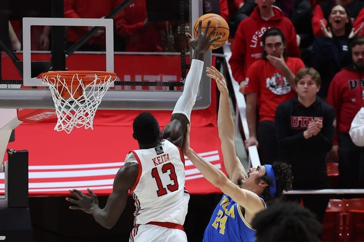 Feb 23, 2023; Salt Lake City, Utah, USA; Utah Utes center Keba Keita (13) blocks the shot of UCLA Bruins guard Jaime Jaquez Jr. (24) in the second half at Jon M. Huntsman Center.