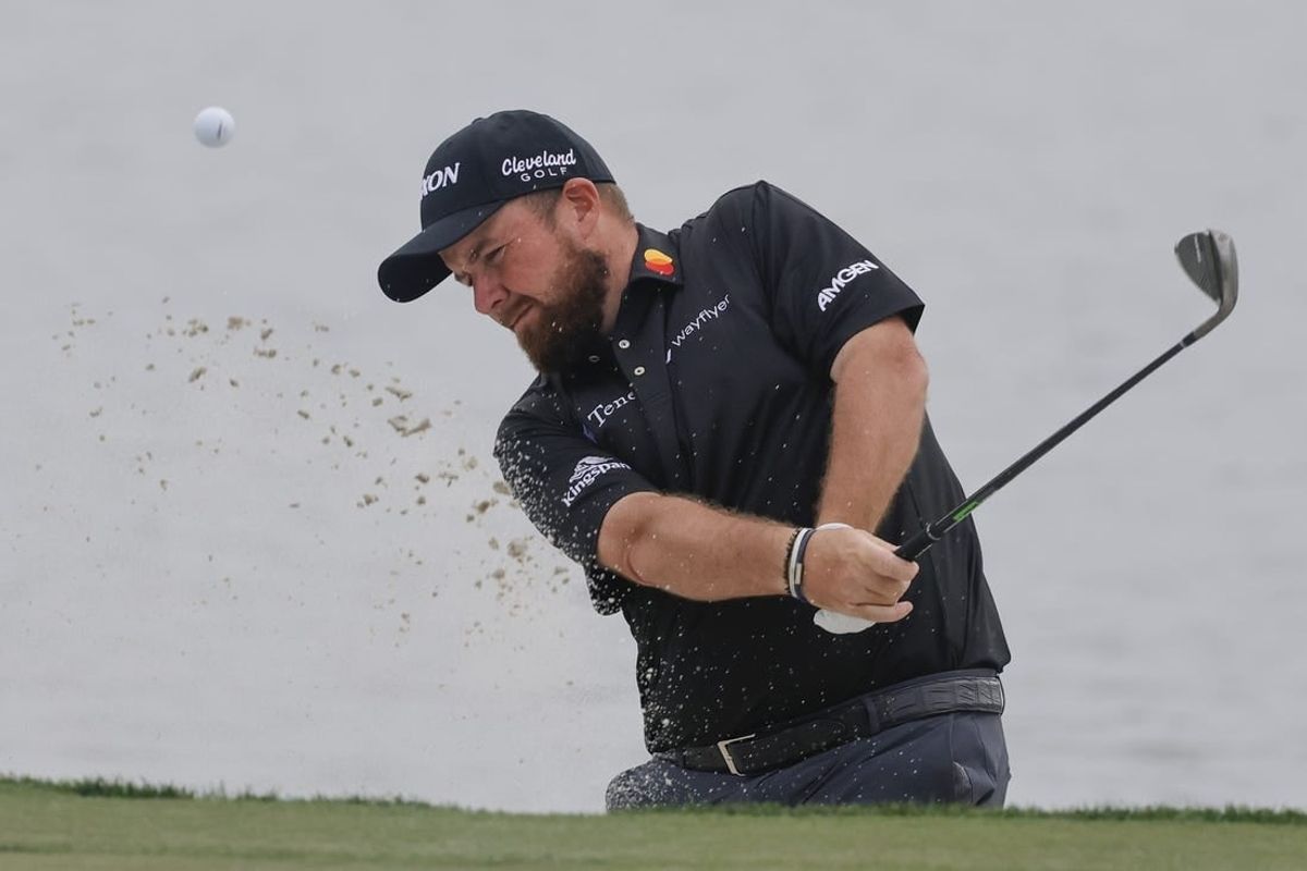Mar 2, 2024; Palm Beach Gardens, Florida, USA;  Shane Lowry hits from the bunker onto the 18th green during the third round of the Cognizant Classic in The Palm Beaches golf tournament.