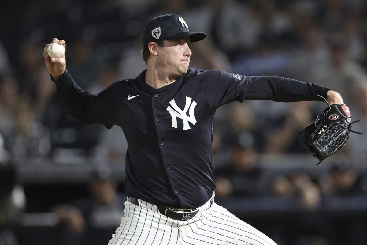 Mar 1, 2024; Tampa, Florida, USA;  New York Yankees starting pitcher Gerrit Cole (45) throws a pitch against the Toronto Blue Jays in the first inning at George M. Steinbrenner Field.