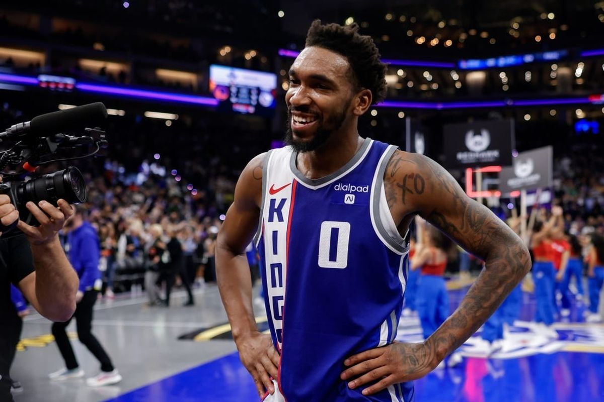 Nov 28, 2023; Sacramento, California, USA; Sacramento Kings guard Malik Monk (0) is interviewed after a game against the Golden State Warriors at Golden 1 Center.