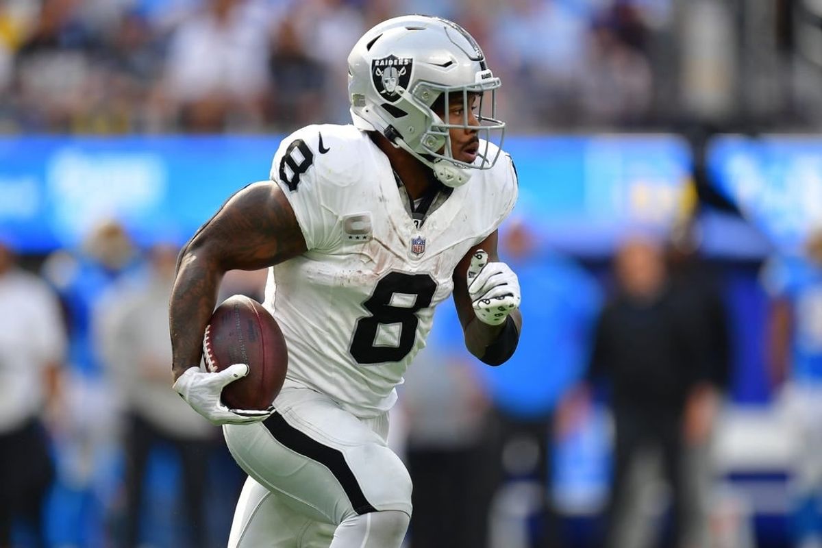Oct 1, 2023; Inglewood, California, USA; Las Vegas Raiders running back Josh Jacobs (8) runs the ball against the Los Angeles Chargers during the second half at SoFi Stadium.