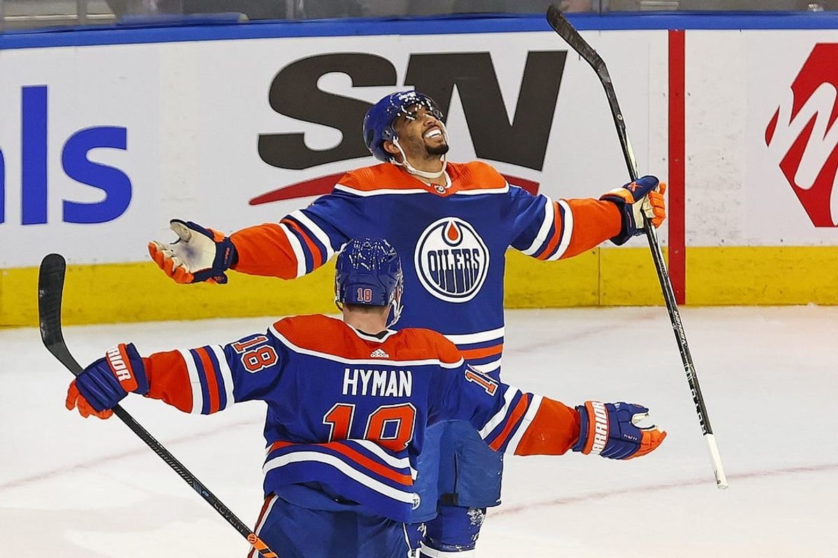 Nov 15, 2023; Edmonton, Alberta, CAN; Edmonton Oilers forward Evander Kane (91) celebrates his over-time winning goal against the Seattle Kraken  at Rogers Place.
