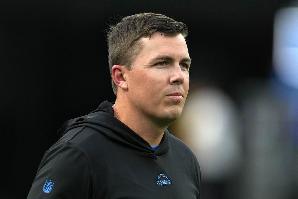 Aug 12, 2023; Inglewood, California, USA;  Los Angeles Chargers offensive coordinator Kellen Moore watches during the game against the Los Angeles Rams at SoFi Stadium.
