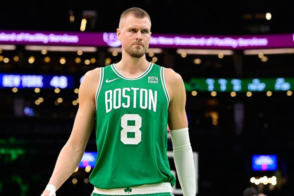 Dec 8, 2023; Boston, Massachusetts, USA;  Boston Celtics center Kristaps Porzingis (8) looks on during the first half against the New York Knicks at TD Garden.