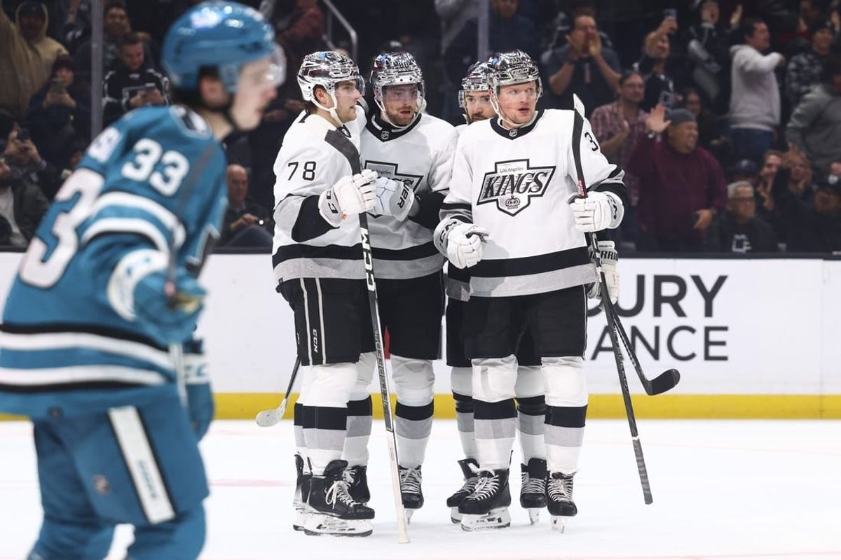 Dec 27, 2023; Los Angeles, California, USA; Los Angeles Kings center Pierre-Luc Dubois (80) celebrates with his teammates after scoring a gaol during the second period of a game against the San Jose Sharks at Crypto.com Arena.