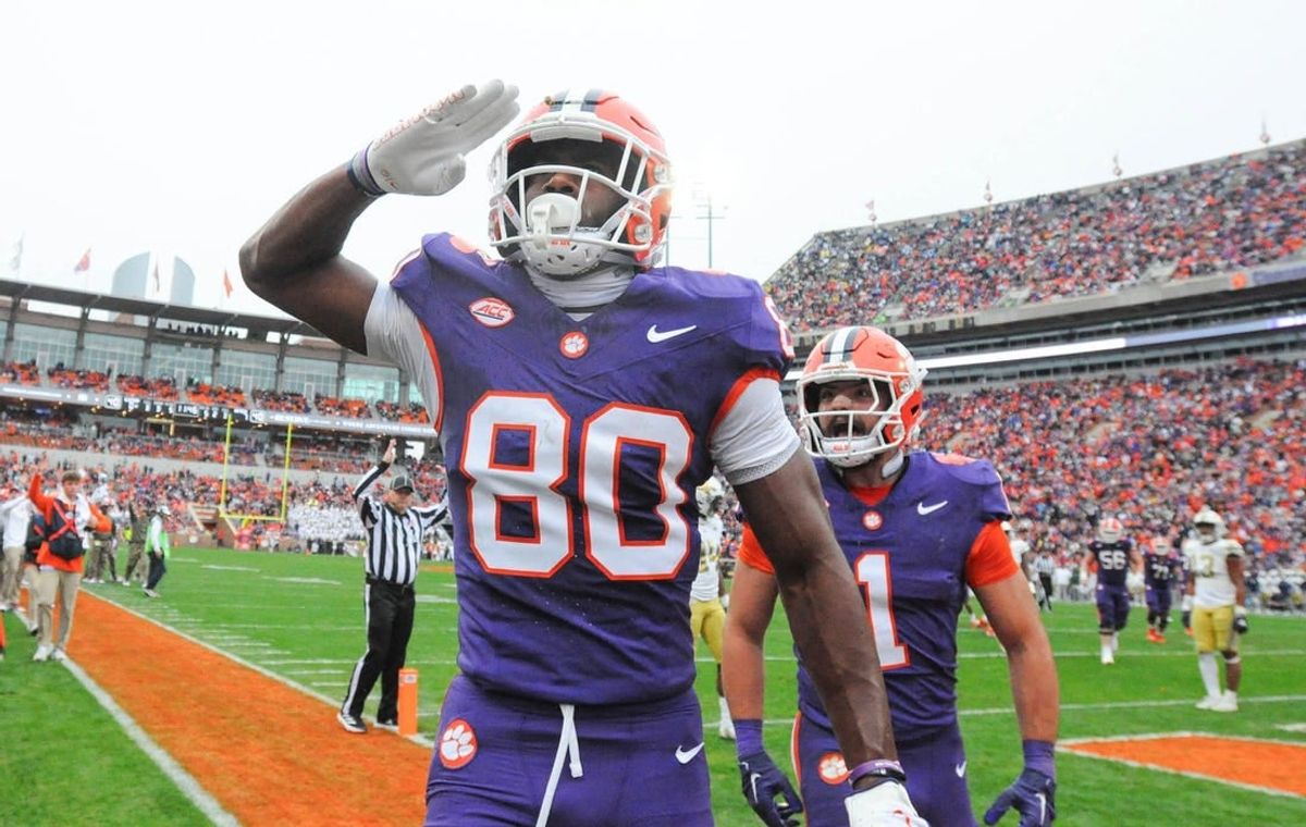 Nov 11, 2023; Clemson, South Carolina, USA; Clemson Tigers wide receiver Beaux Collins (80) salutes after scoring against the Georgia Tech Yellow Jackets during the second quarter at Memorial Stadium.