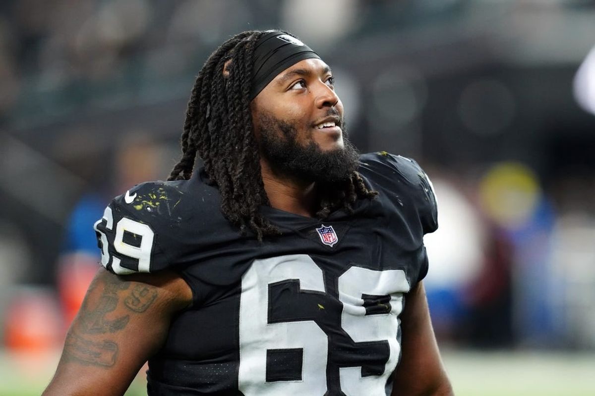 Dec 14, 2023; Paradise, Nevada, USA;  Las Vegas Raiders defensive tackle Adam Butler (69) smiles after the game against the Los Angeles Chargers at Allegiant Stadium.