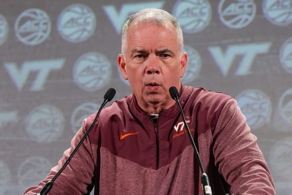 Oct 25, 2023; Charlotte, NC, USA;   Virginia Tech coach Mike Young  speaks to the media during the ACC Tipoff at Hilton Charlotte Uptown.