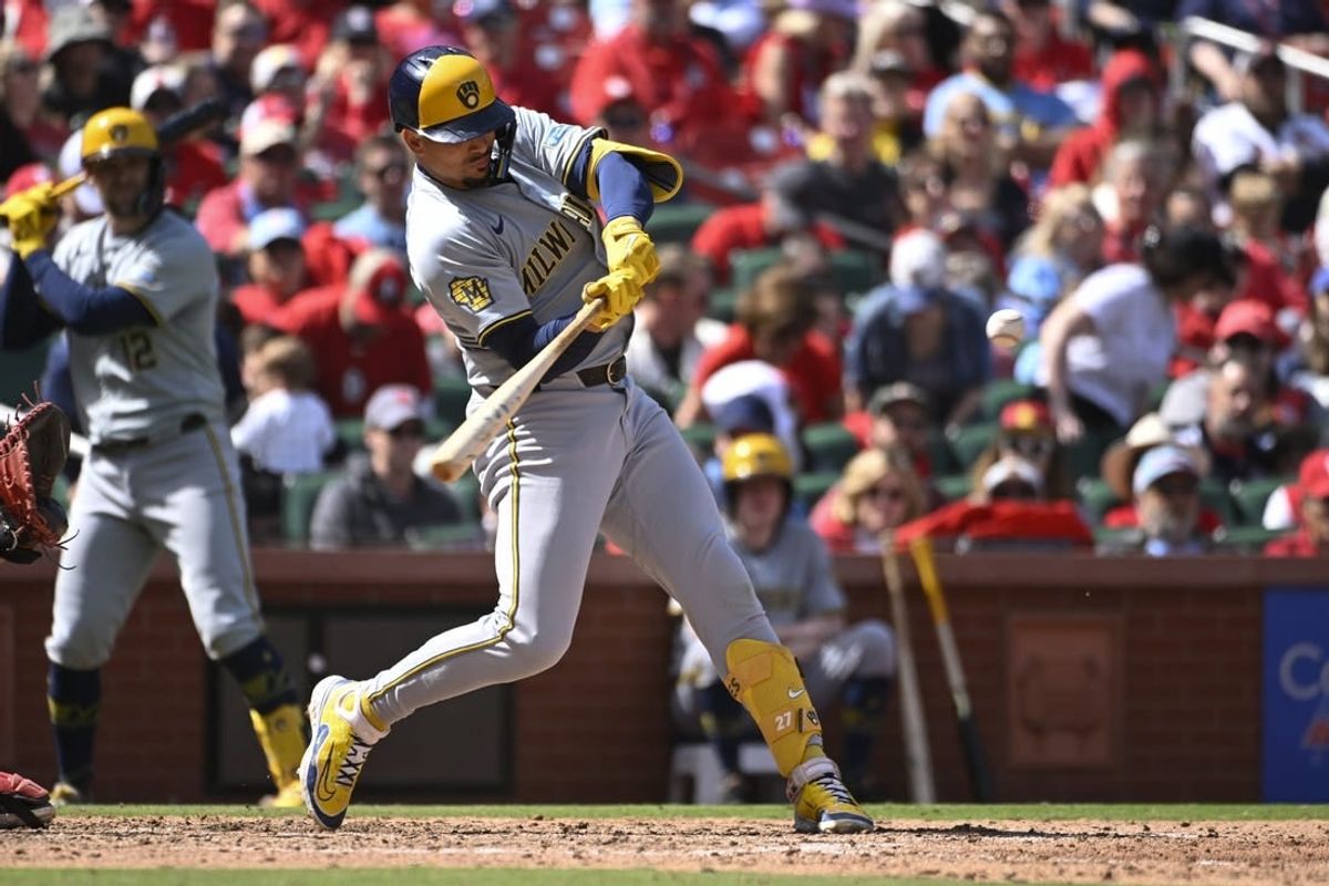Apr 20, 2024; St. Louis, Missouri, USA; Milwaukee Brewers shortstop Willy Adames (27) hits an RBI double against the St. Louis Cardinals in the sixth inning at Busch Stadium.