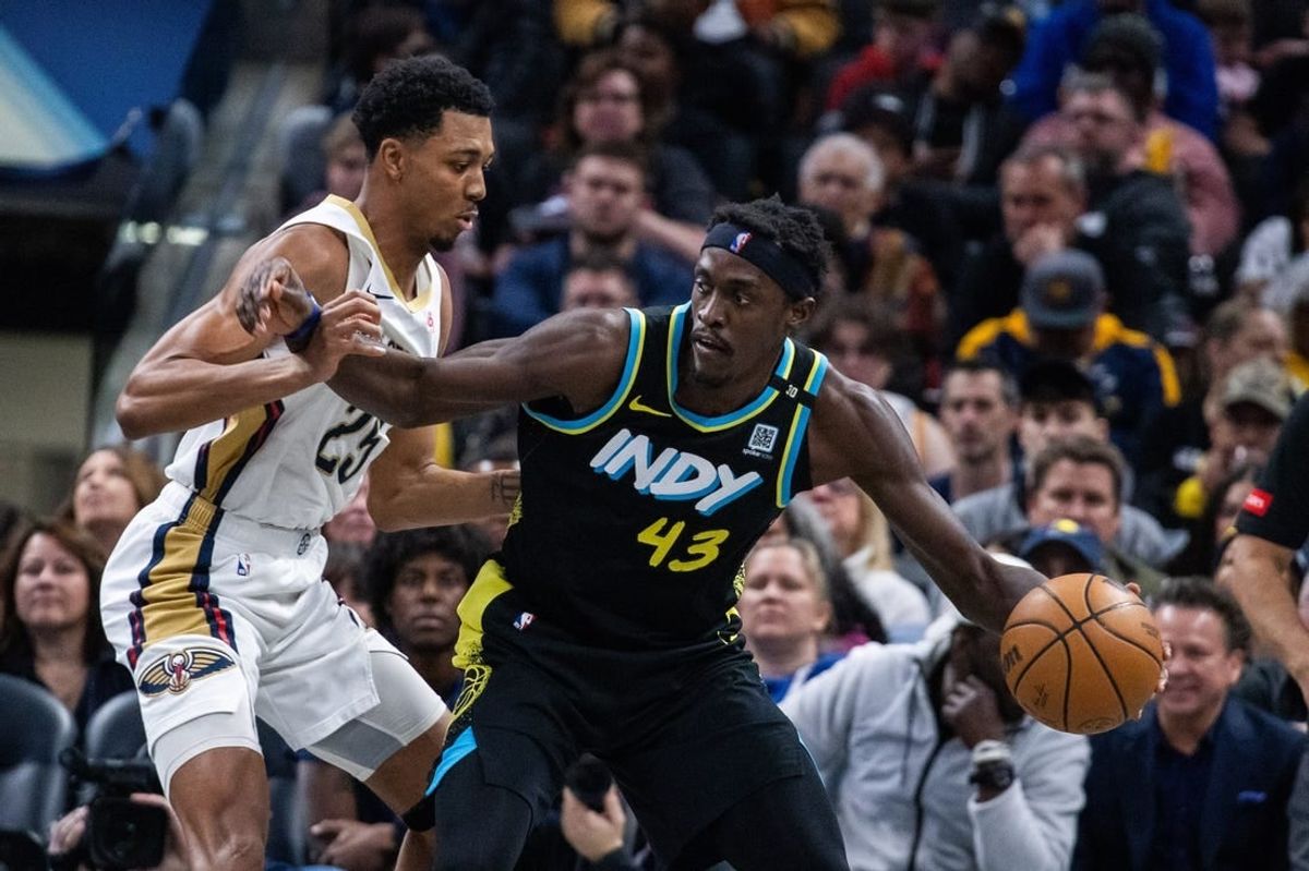 Feb 28, 2024; Indianapolis, Indiana, USA; Indiana Pacers forward Pascal Siakam (43) dribbles the ball while New Orleans Pelicans guard Trey Murphy III (25) defends in the first half at Gainbridge Fieldhouse.