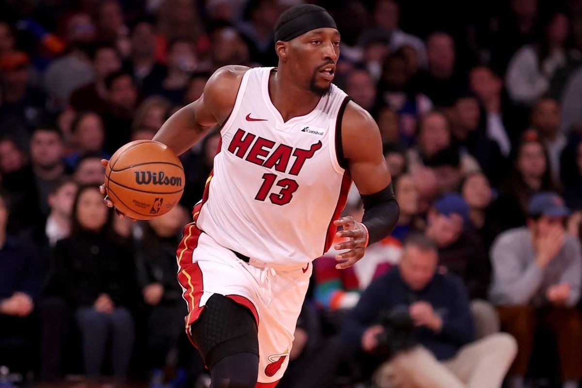 Nov 24, 2023; New York, New York, USA; Miami Heat center Bam Adebayo (13) brings the ball up court against the New York Knicks during the first quarter at Madison Square Garden.