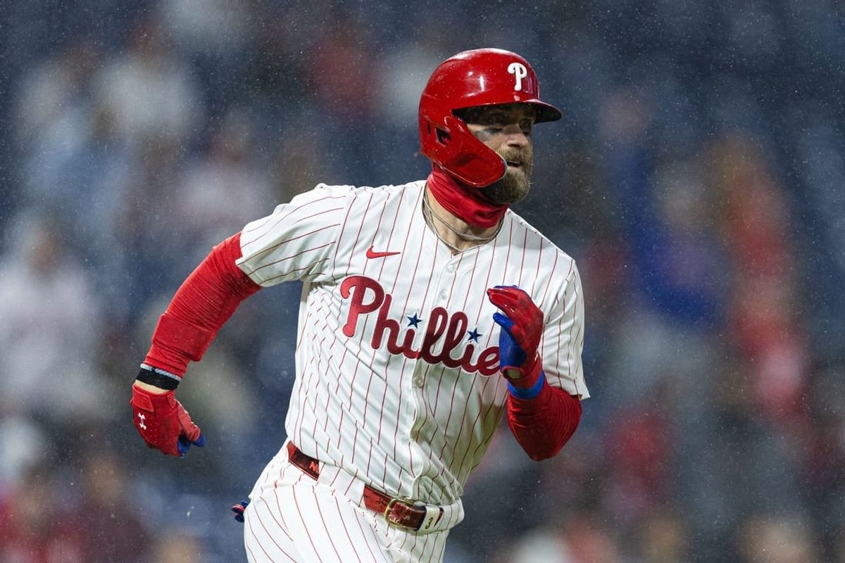 Apr 2, 2024; Philadelphia, Pennsylvania, USA; Philadelphia Phillies first baseman Bryce Harper (3) runs the bases after hitting his second home run of the game during the fourth inning against the Cincinnati Reds at Citizens Bank Park.