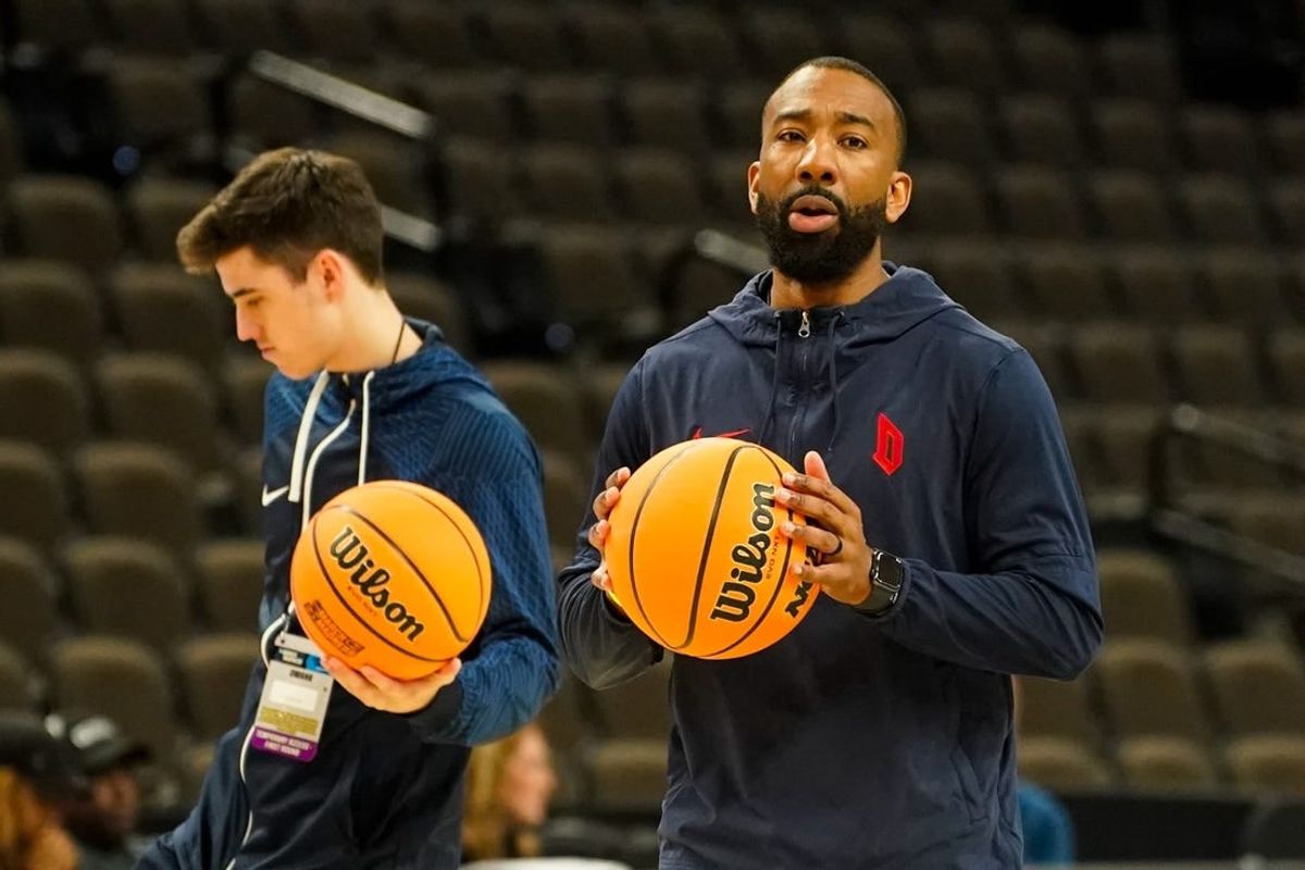 Mar 20, 2024; Omaha, NE, USA; Duquesne Dukes assistant coach Dru Joyce III talks to players during the NCAA first round practice session at CHI Health Center Omaha.
