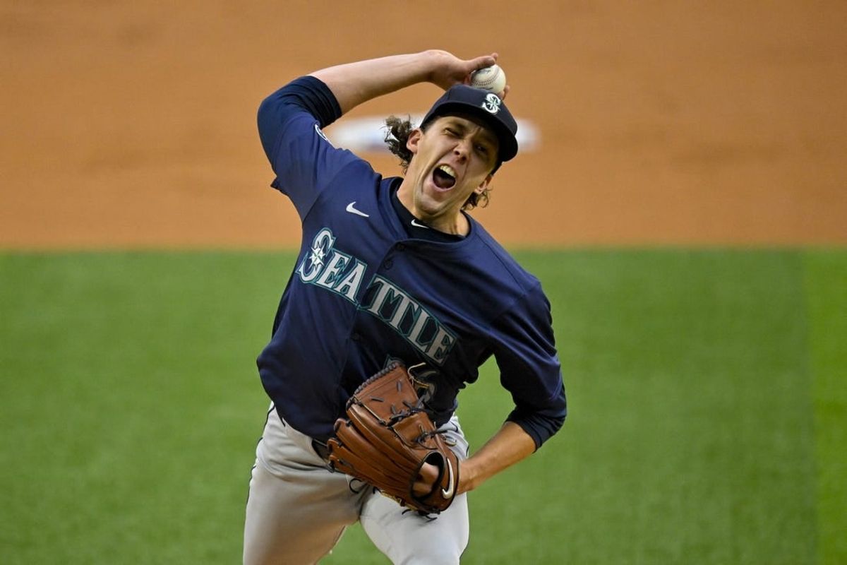 Apr 23, 2024; Arlington, Texas, USA; Seattle Mariners starting pitcher Logan Gilbert (36) pitches against the Texas Rangers during the first inning at Globe Life Field.