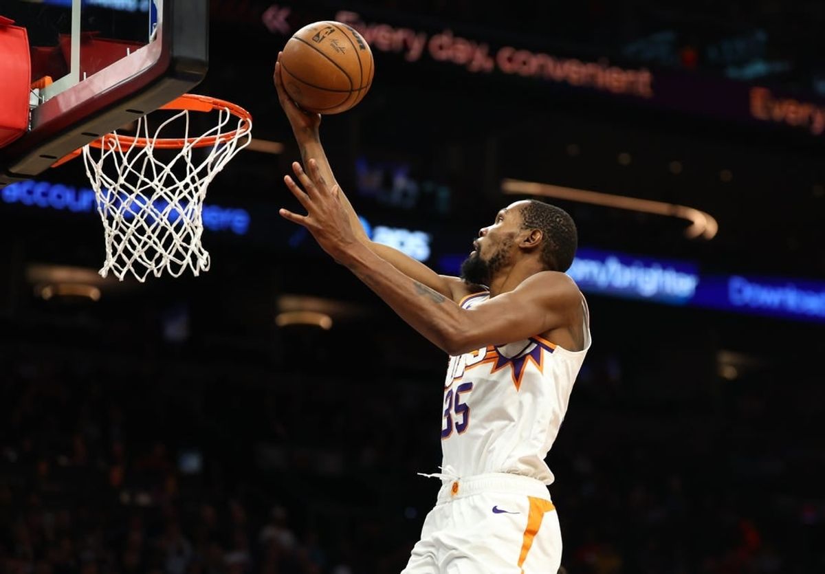Nov 22, 2023; Phoenix, Arizona, USA; Phoenix Suns forward Kevin Durant (35) against the Golden State Warriors in the second half at Footprint Center.
