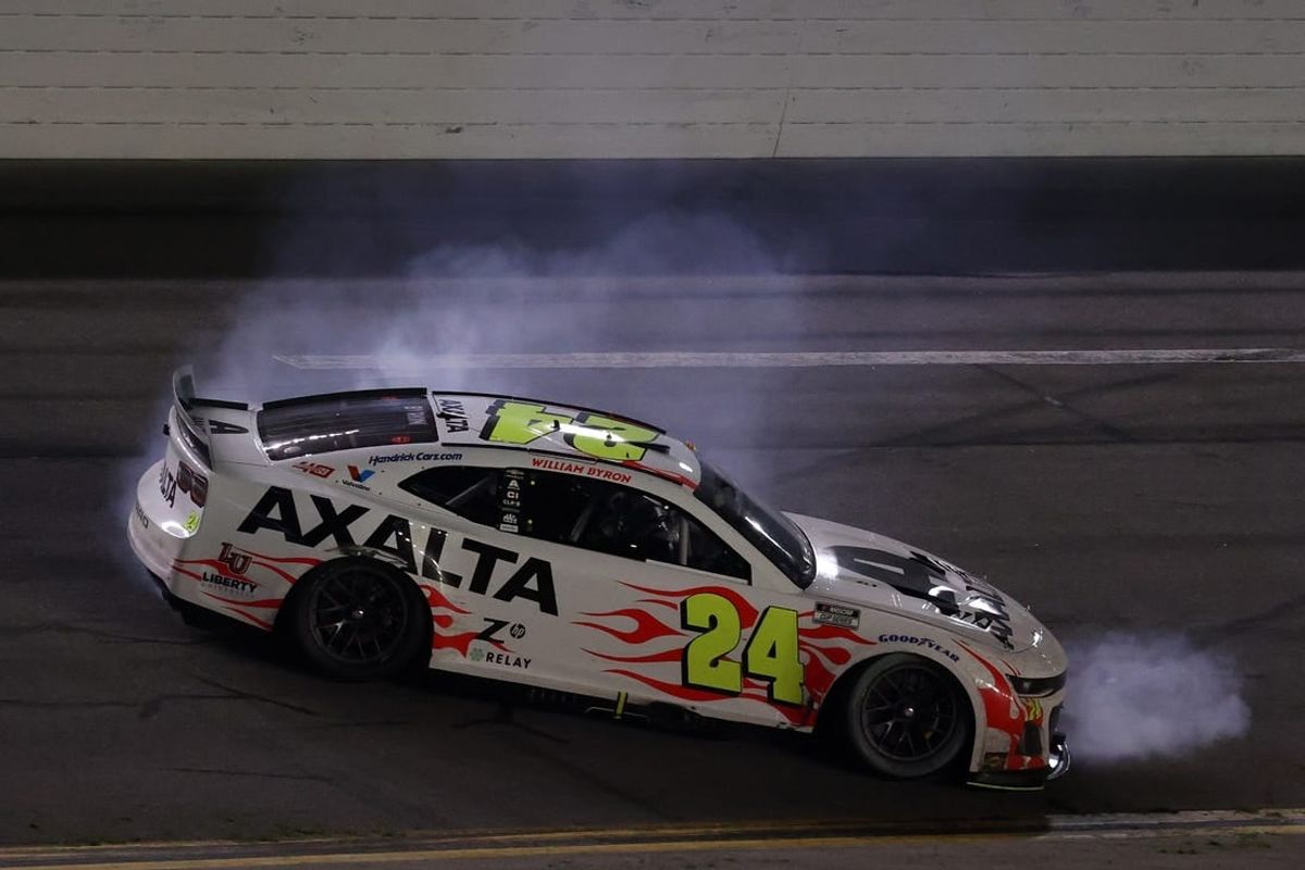 Feb 19, 2024; Daytona Beach, Florida, USA; NASCAR Cup Series driver William Byron (24) does a burn out after winning the Daytona 500 at Daytona International Speedway.