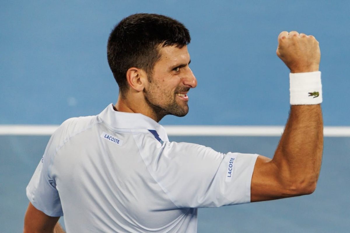 Jan 21, 2024; Melbourne, Victoria, Australia; Novak Djokovic of Serbia celebrates his victory over Adrian Mannarino of France in the forth round of the men s singles at the Australian Open 2024.