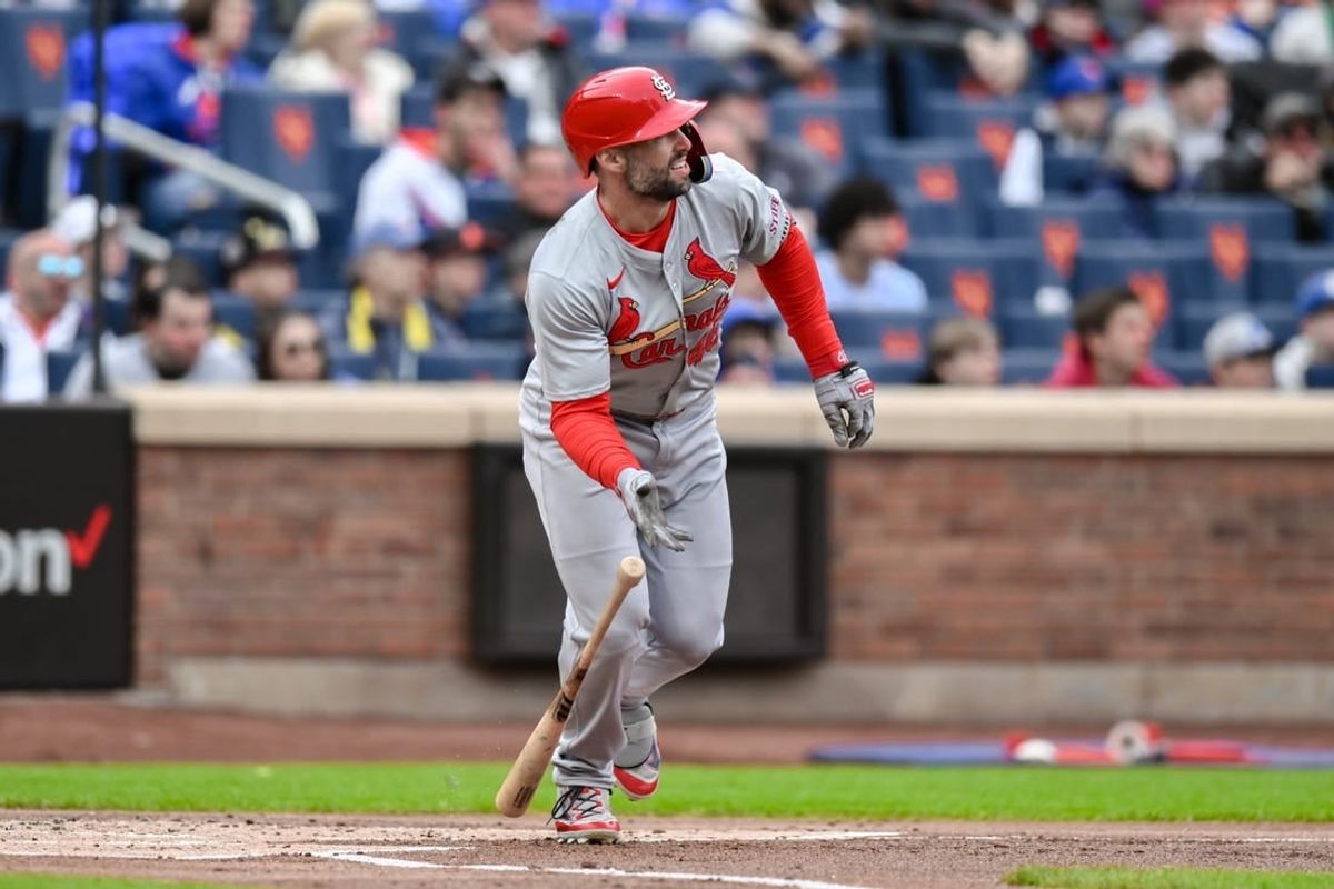Apr 27, 2024; New York City, New York, USA; St. Louis Cardinals first baseman Paul Goldschmidt (46) hits a two RBI double during the first inning against the New York Mets at Citi Field.