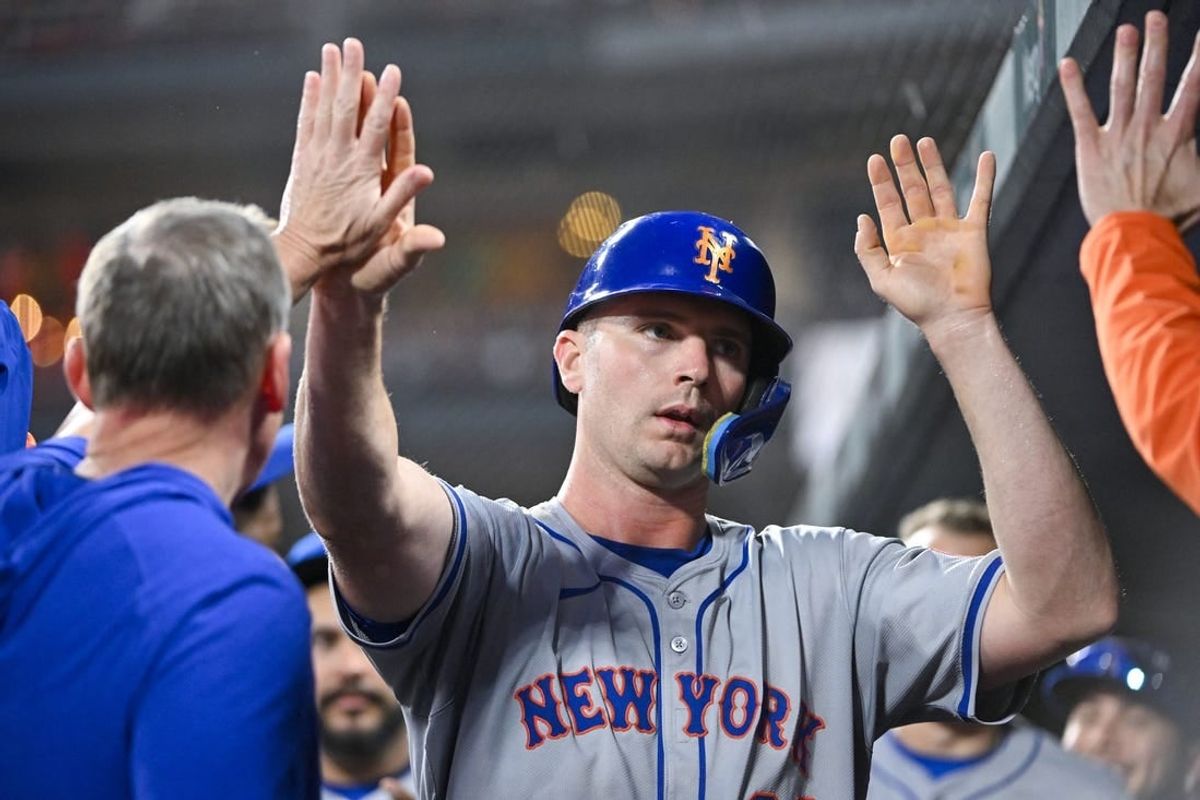 May 7, 2024; St. Louis, Missouri, USA;  New York Mets first baseman Pete Alonso (20) is congratulated by teammates after hitting a two run double and scoring a run against the St. Louis Cardinals during the fifth inning at Busch Stadium.