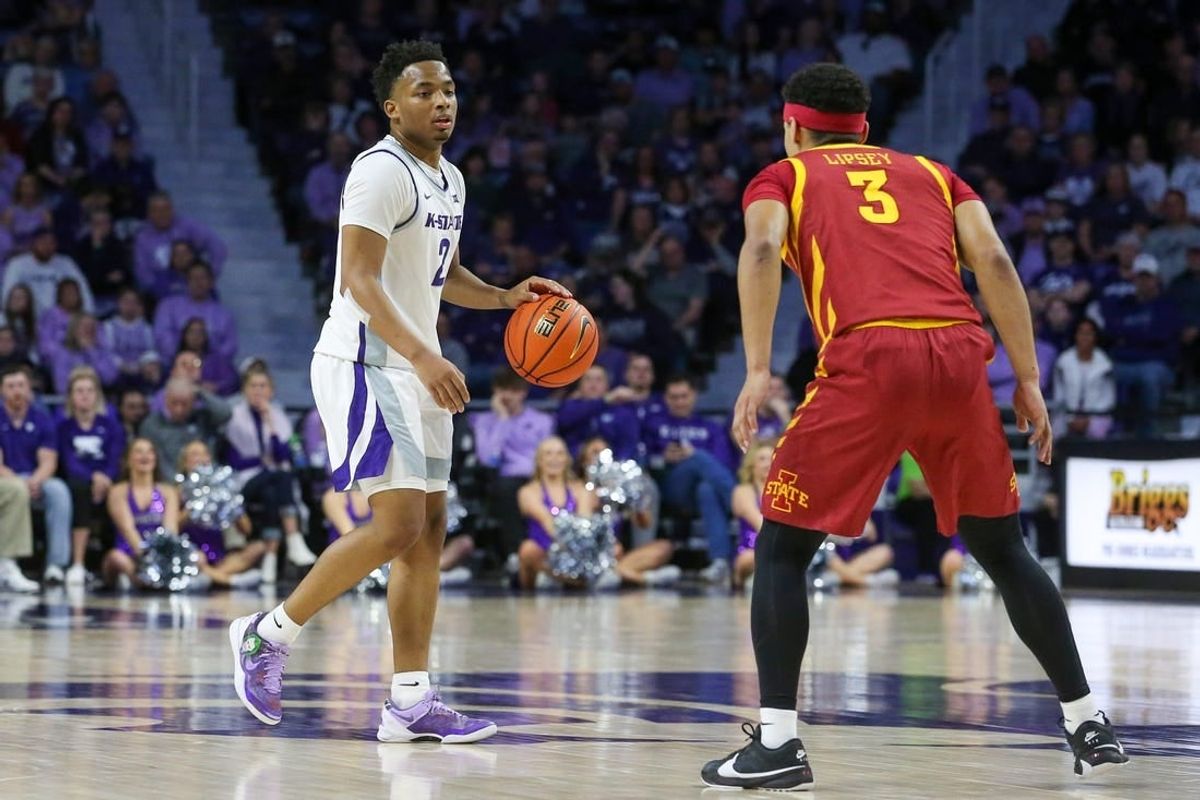 Mar 9, 2024; Manhattan, Kansas, USA; Kansas State Wildcats guard Tylor Perry (2) brings the ball up court against Iowa State Cyclones guard Tamin Lipsey (3) doing the first half at Bramlage Coliseum.