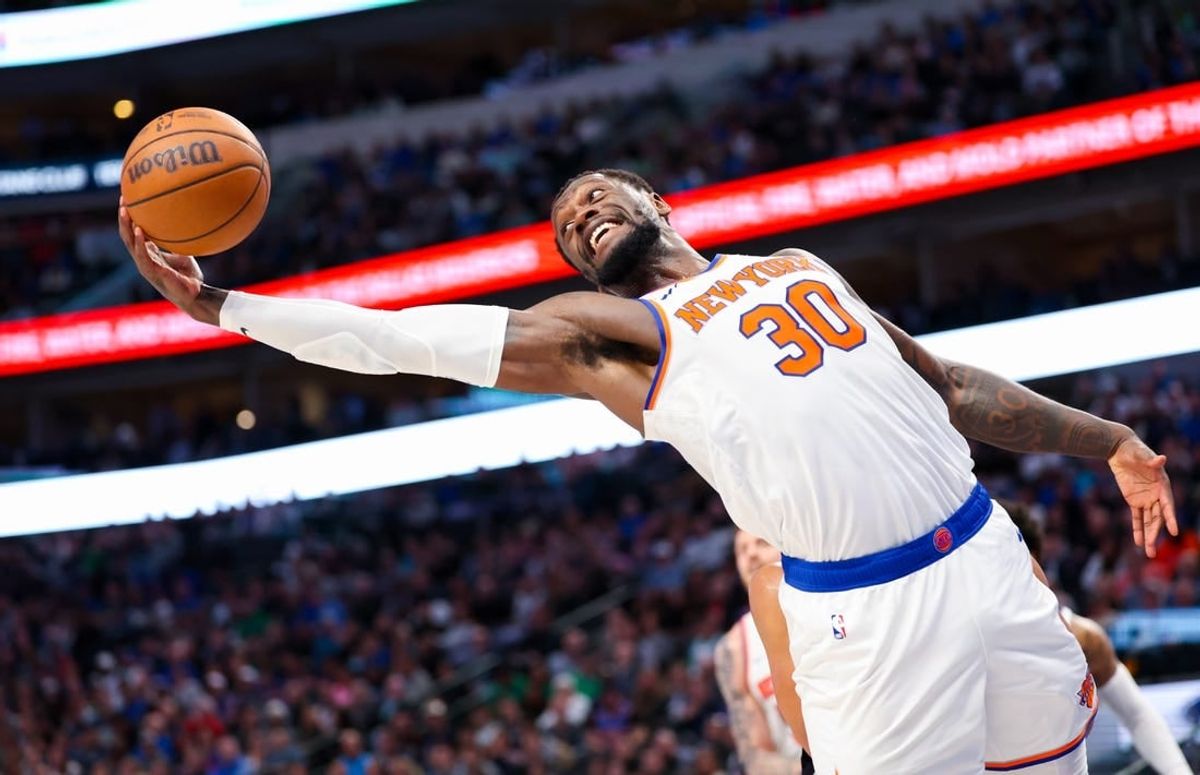 Jan 11, 2024; Dallas, Texas, USA;  New York Knicks forward Julius Randle (30) grabs a rebound during the first half against the Dallas Mavericks at American Airlines Center.