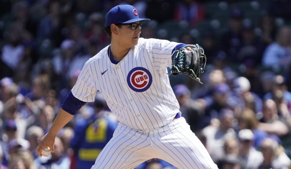 May 5, 2024; Chicago, Illinois, USA; Chicago Cubs pitcher Javier Assad (72) throws the ball against the Milwaukee Brewers during the first inning at Wrigley Field.