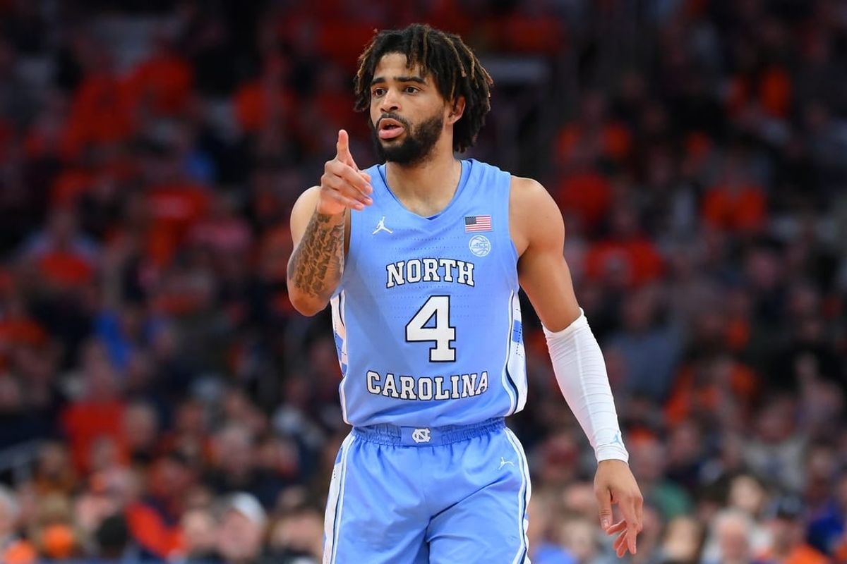 Feb 13, 2024; Syracuse, New York, USA; North Carolina Tar Heels guard RJ Davis (4) reacts to a play against the Syracuse Orange during the first half at the JMA Wireless Dome.