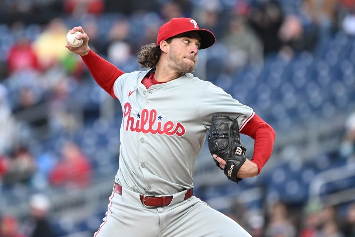 Apr 5, 2024; Washington, District of Columbia, USA; Philadelphia Phillies starting pitcher Aaron Nola (27) pitches against the Washington Nationals during the first inning at Nationals Park.