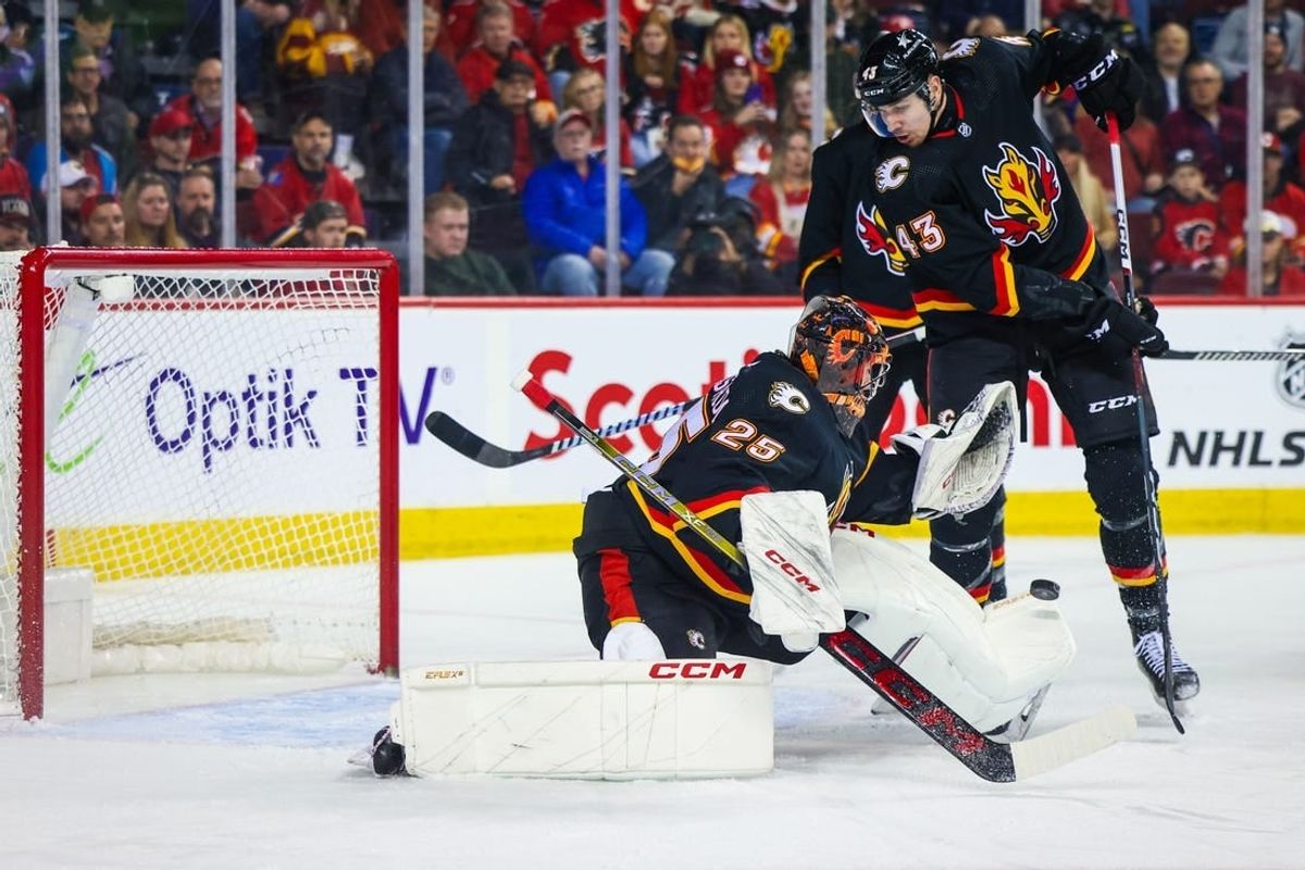 Jan 23, 2024; Calgary, Alberta, CAN; Calgary Flames goaltender Jacob Markstrom (25) makes a save against the St. Louis Blues during the first period at Scotiabank Saddledome.