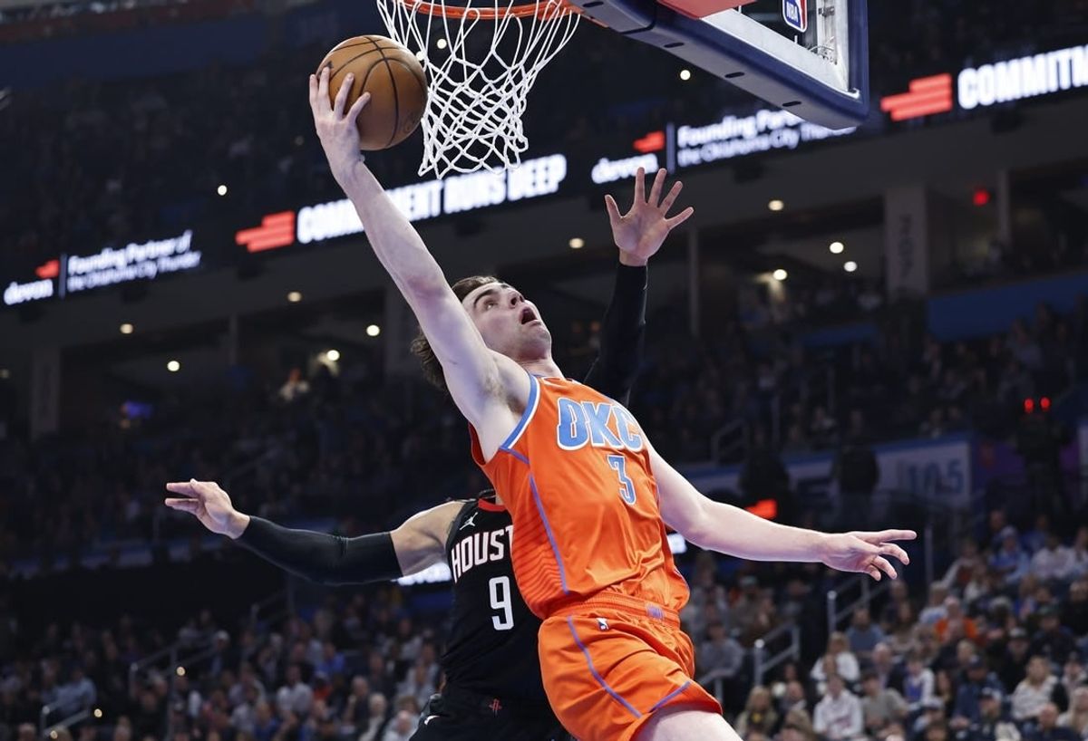 Mar 27, 2024; Oklahoma City, Oklahoma, USA; Oklahoma City Thunder guard Josh Giddey (3) shoots in front of Houston Rockets forward Dillon Brooks (9) during the second quarter at Paycom Center.