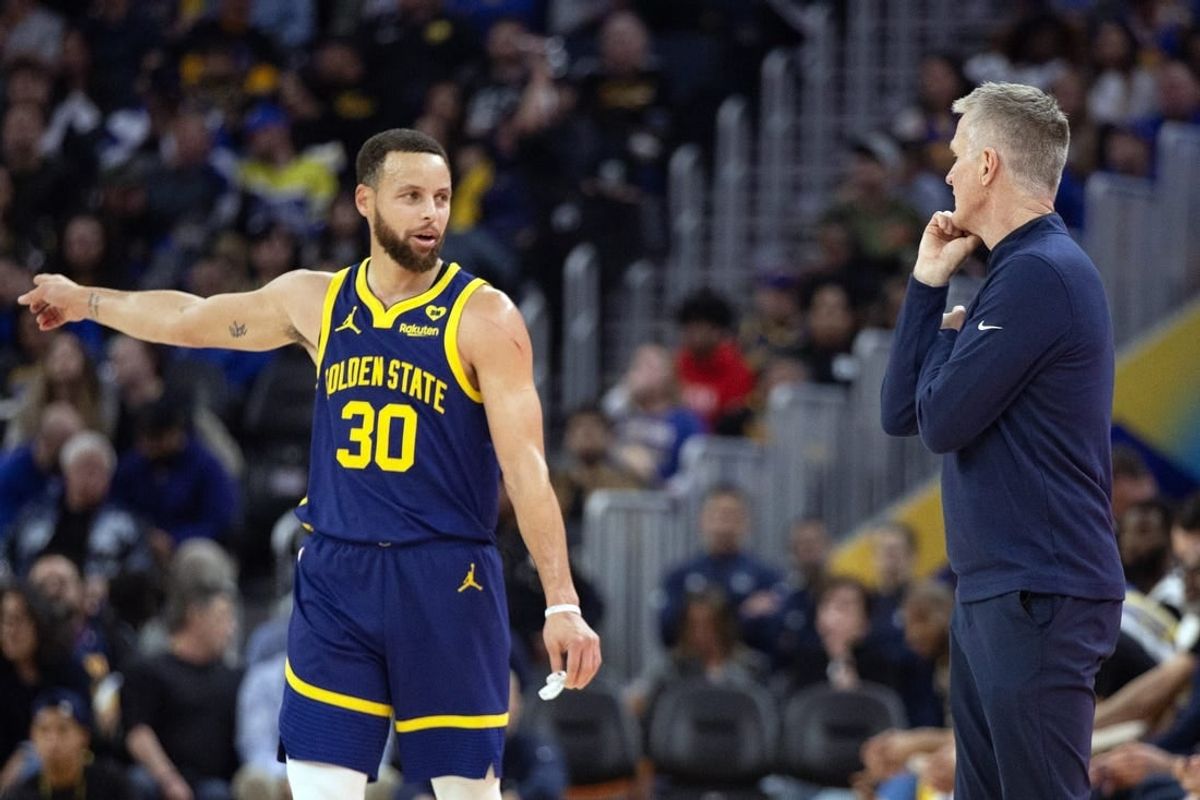 Jan 25, 2024; San Francisco, California, USA; Golden State Warriors guard Stephen Curry (30) consults with head coach Steve Kerr during the first quarter against the Sacramento Kings at Chase Center.