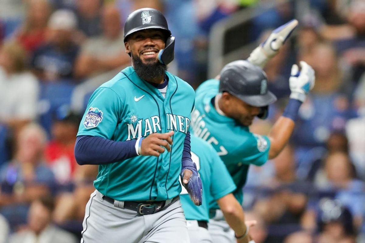 Sep 9, 2023; St. Petersburg, Florida, USA;  Seattle Mariners right fielder Teoscar Hernandez (35) celebrates after scoring a run against the Tampa Bay Rays in the first inning at Tropicana Field.