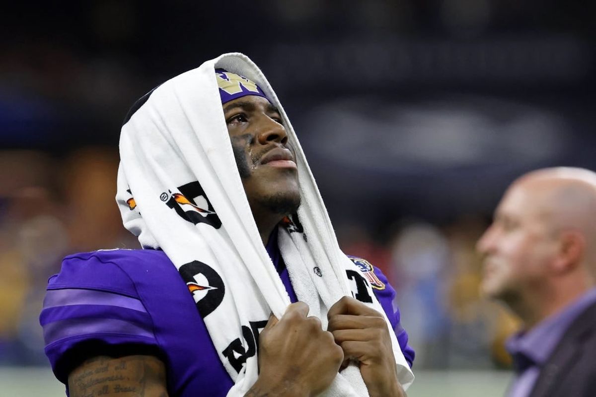 Jan 1, 2024; New Orleans, LA, USA; Washington Huskies wide receiver Germie Bernard (4) watches a video review during the fourth quarter of the 2024 Sugar Bowl college football playoff semifinal game at Caesars Superdome.